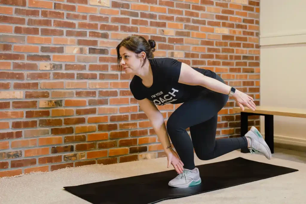 Tone Your Arms in Just One Week: Achieve Results Without the Gym! 1 A person exercising their arms at home with light weights Bradford