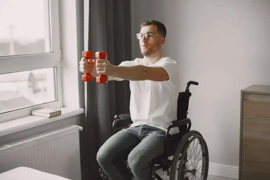 Image of man doing exercise in his wheelchair to aid weight loss Bradford