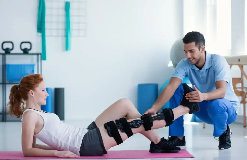 Woman having treatment to help muscle recovery Bradford after an injury